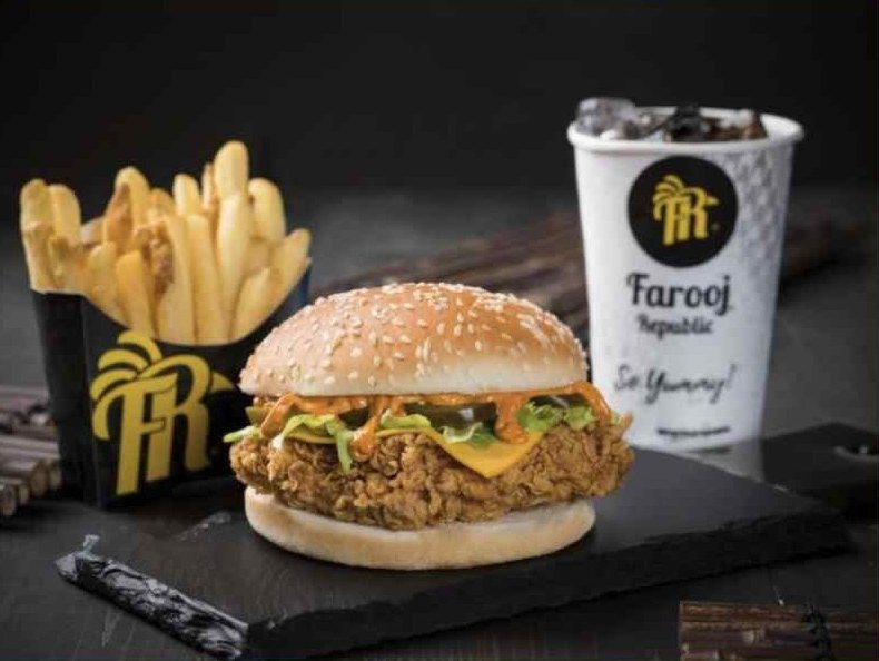 Crispy chicken sandwich meal with fries and a drink